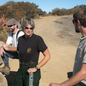 2008: Cindy conferring with staff/environmentalist on controversial fire line