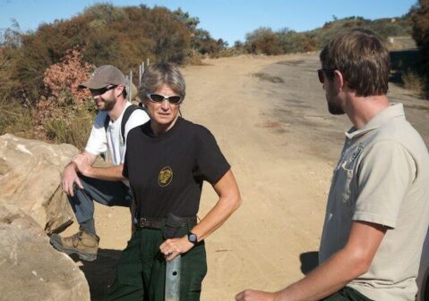 2008: Cindy conferring with staff/environmentalist on controversial fire line
