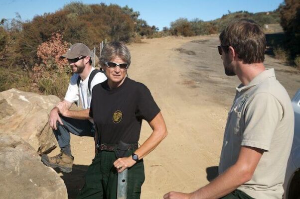 2008: Cindy conferring with staff/environmentalist on controversial fire line