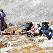 1988: Meeting "Rambler friends" maybe near Jackass Pass, Cindy standing viewing lakes